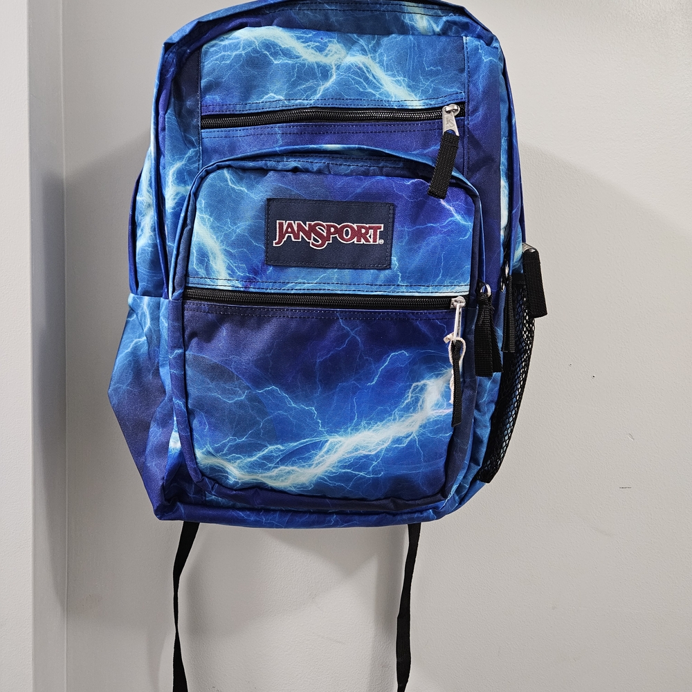 JanSport Blue Backpack with Dynamic Pattern